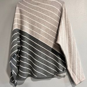 Poncho style knitted sweater